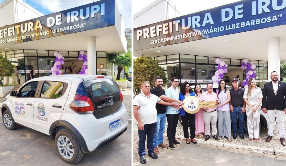 Veículo oficial do programa Mulher Viva+ estacionado em frente à sede da Prefeitura de Irupi, durante cerimônia de entrega do kit com presença da secretária estadual, prefeito, vice-prefeito e equipe municipal segurando chave simbólica do Kit Mulher Viva+.